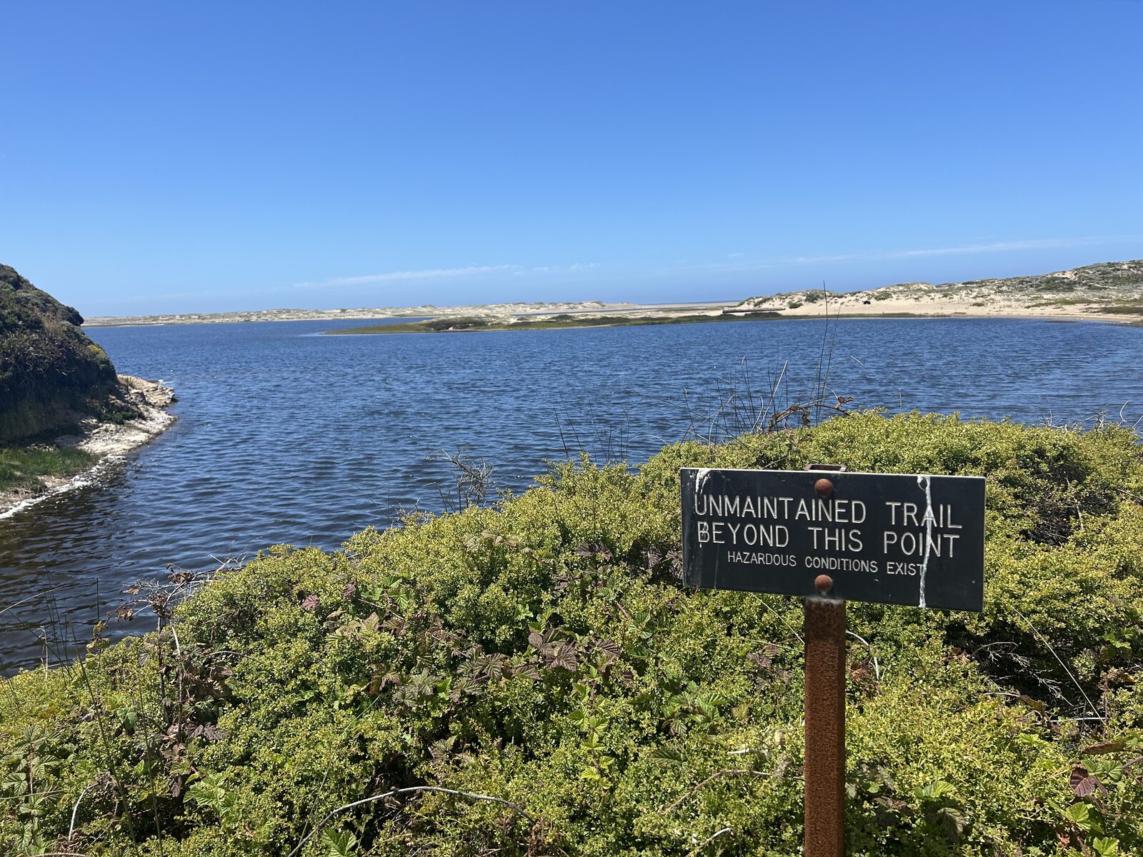 Unmaintained Trail Beyond This Point sign